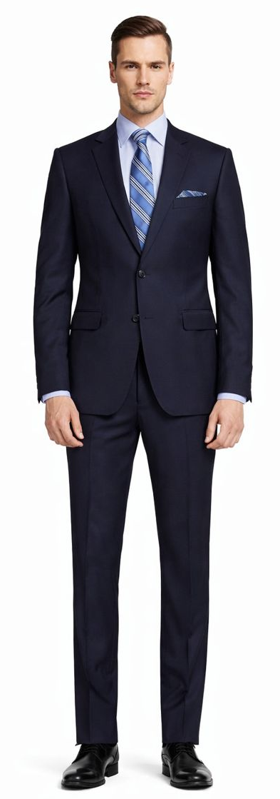 Navy blue two-button suit in a slim/modern fit. Solid, smooth fabric. Unstructured jacket with two side pockets. Straight-cut trousers taper to the ankle.
