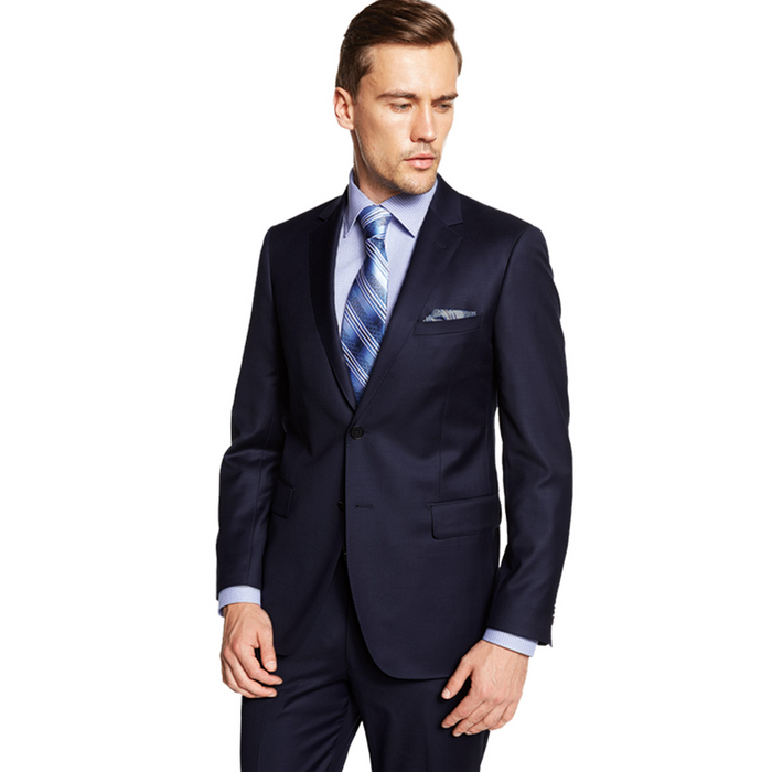 Dark navy suit jacket. Two-button, slim/modern fit. Notched lapel, front & breast pockets. Tailored shape, structured for a fitted appearance. Uniform dark blue.
