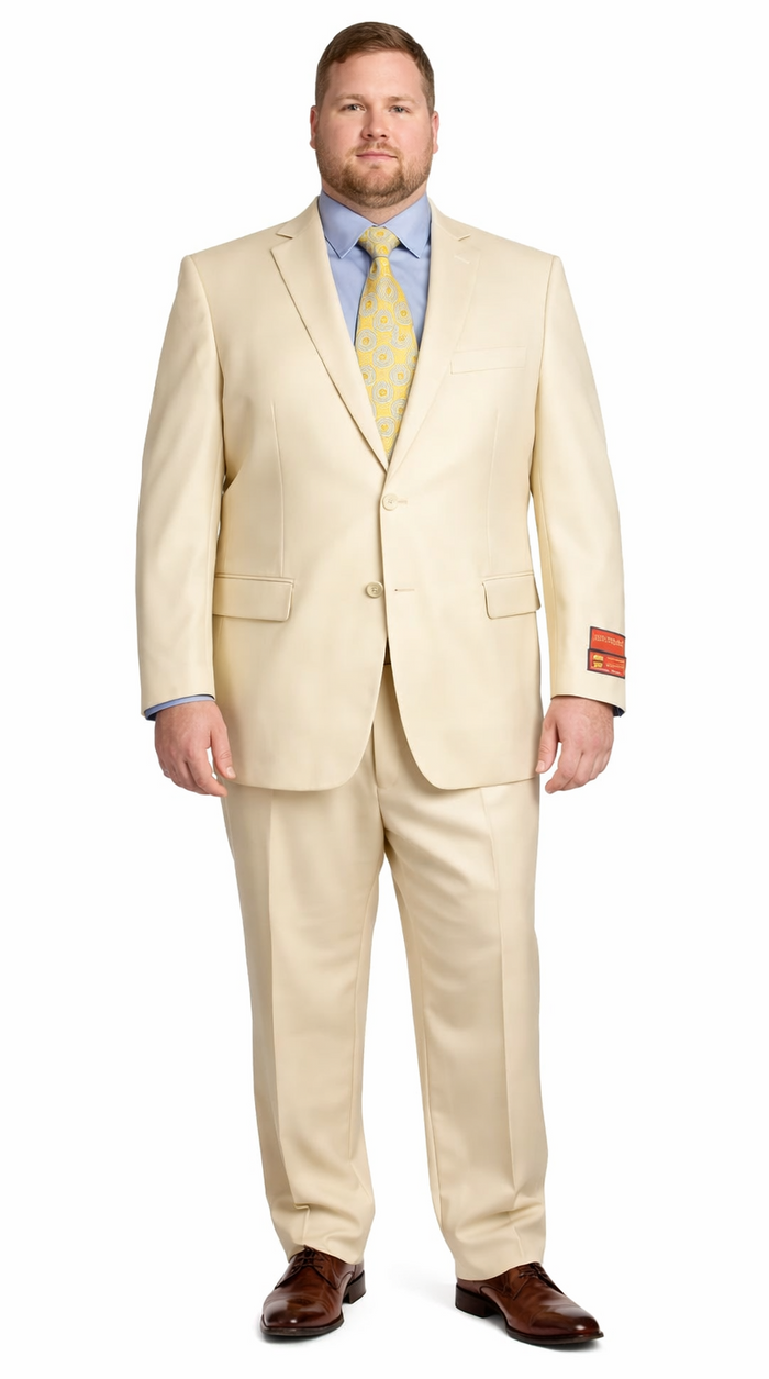 Mantoni beige wool suit. Two-button jacket, notched lapel, front pockets. Straight-cut trousers. Includes blue shirt and patterned yellow/blue tie.
