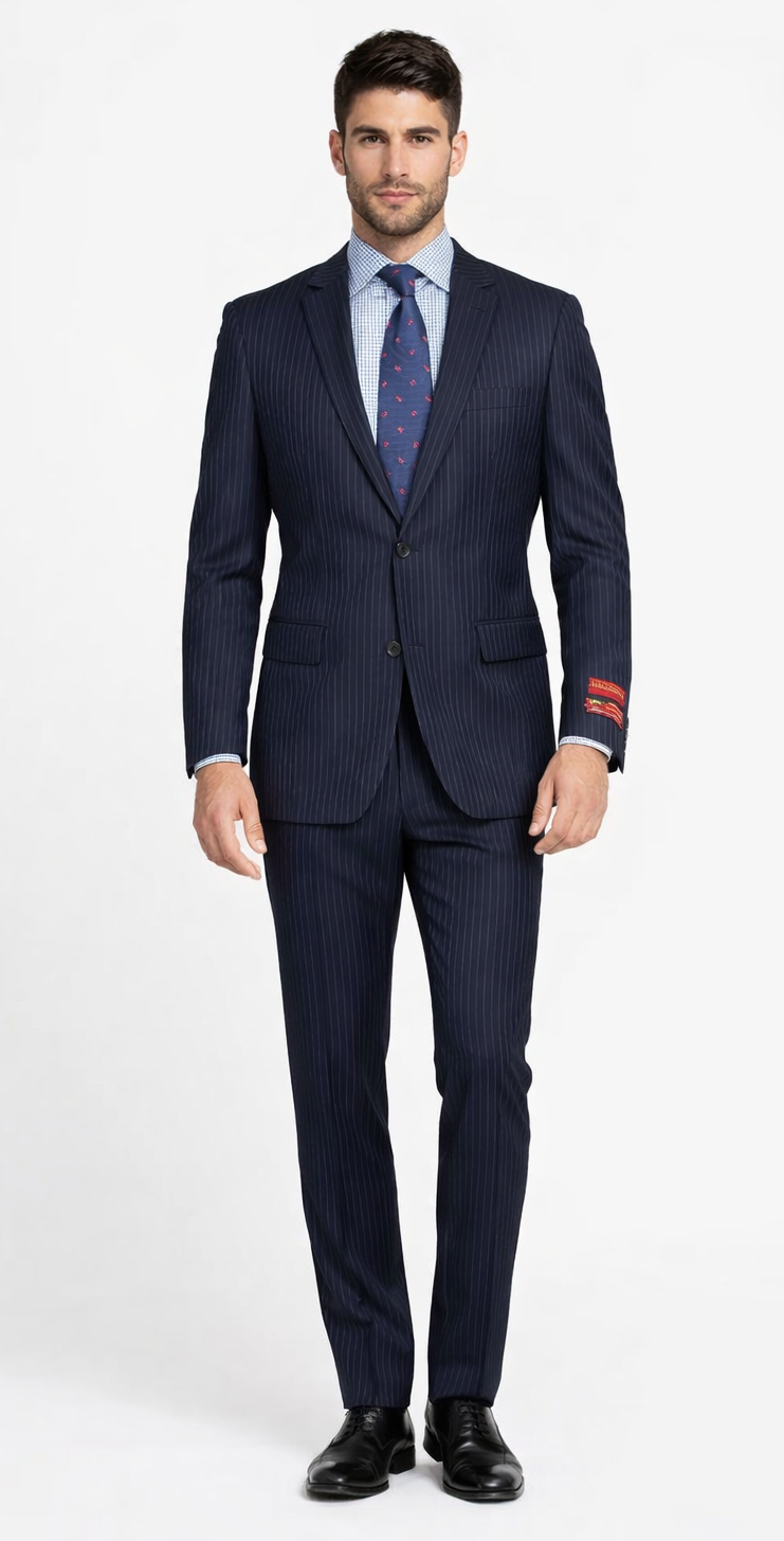 Mantoni two-button wool suit in navy with gray/black stripes. Structured jacket, straight-leg trousers. Features notched lapels, fitted shape, and contrasting sleeves. Tailored fit emphasized.
