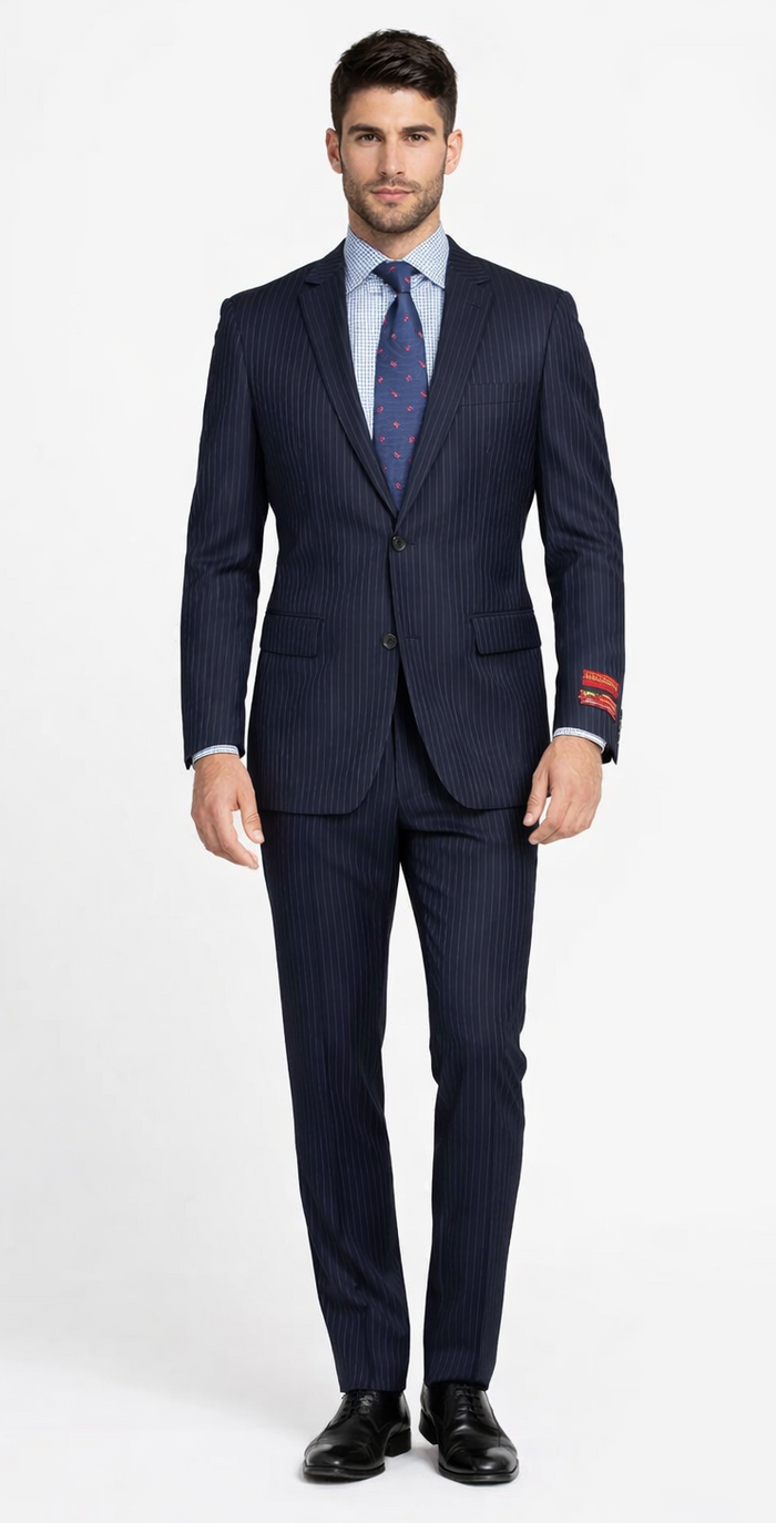 Mantoni two-button wool suit in navy with gray/black stripes. Structured jacket, straight-leg trousers. Features notched lapels, fitted shape, and contrasting sleeves. Tailored fit emphasized.
