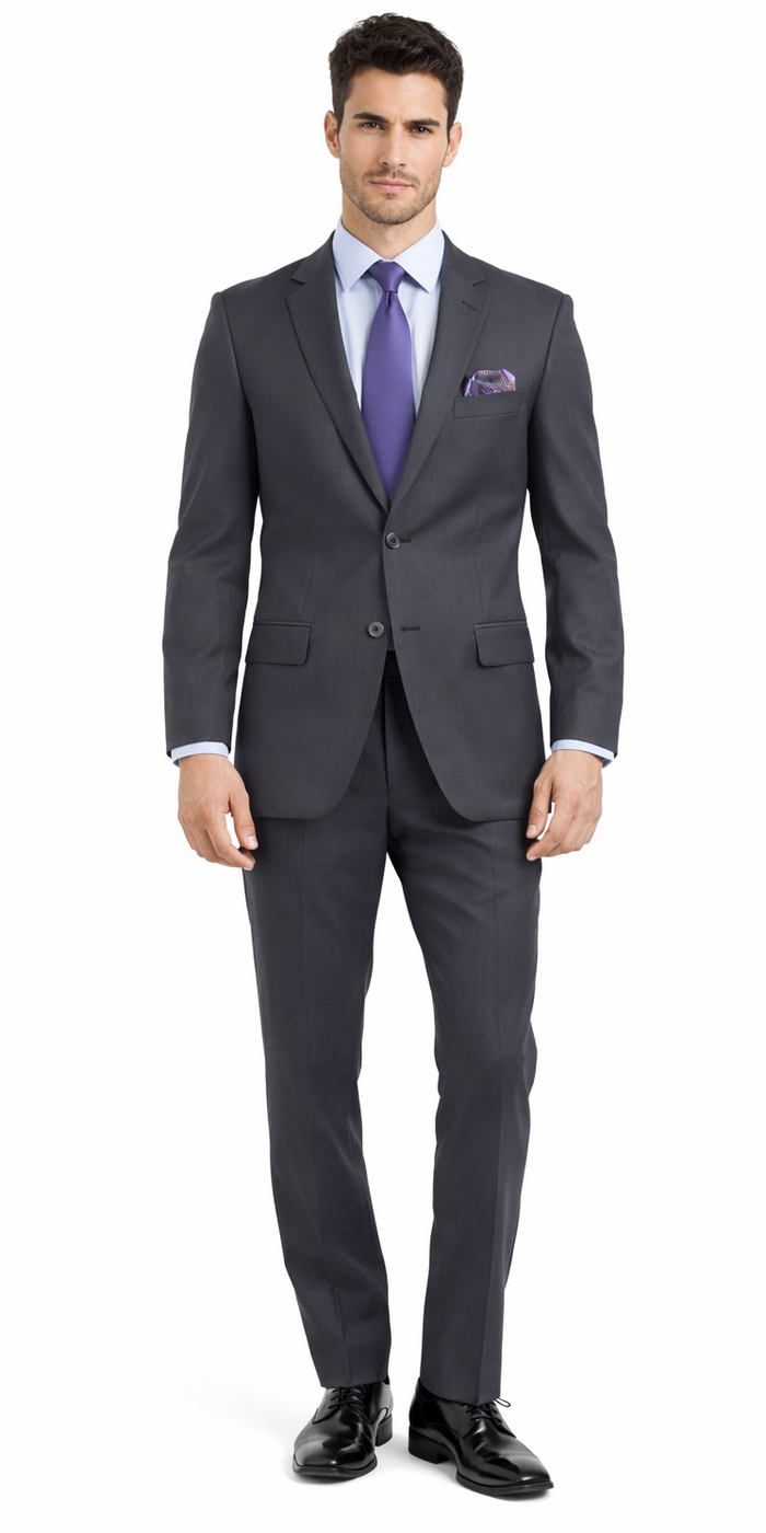 Black & gray striped wool suit with a slim, tailored fit. Two-button jacket with notched lapel & pockets. Flat-front, tapered trousers. Paired with a light blue shirt and purple tie.
