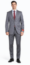 Albertonardoni Mantoni gray super wool suit. Tailored fit, lightweight gray wool. Two-button jacket, notched lapel, two pockets, single-vent. Straight-cut pants. Consistent color, subtle sheen. Decorative cuff detail.
