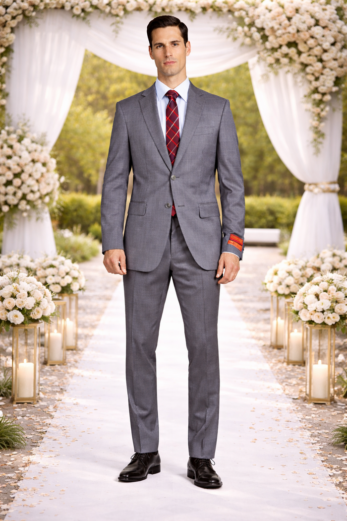 Mantoni gray super wool suit: Tailored fit, two-button front, notch lapels. Fine gray super wool. Straight-cut trousers. Minimalist jacket with contrasting cuff label. Modern, streamlined design.
