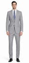 Mantoni light gray wool suit with a modern/slim fit. Single-breasted jacket, notch lapels, and straight-leg trousers. Subtle textured fabric. Offers a cohesive, structured look.
