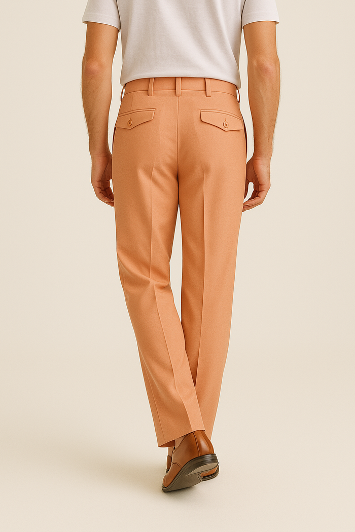 Tiglio Luxe Marbella dress pants: semi-wide leg, light orange wool. Features include a neat waistband and two back flap pockets with buttons, offering a tailored look.
