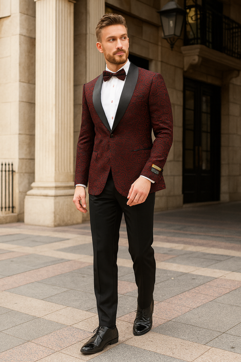 Burgundy paisley tuxedo jacket for men, slim fit with black satin lapel. Features burgundy paisley pattern, paired with a bowtie for a sophisticated look.
