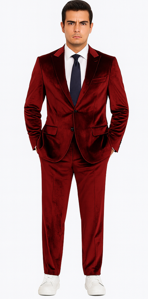 Burgundy velvet men's suit: slim fit, peak lapel, single-button jacket with two pockets. Tailored trousers complete the two-piece ensemble.
