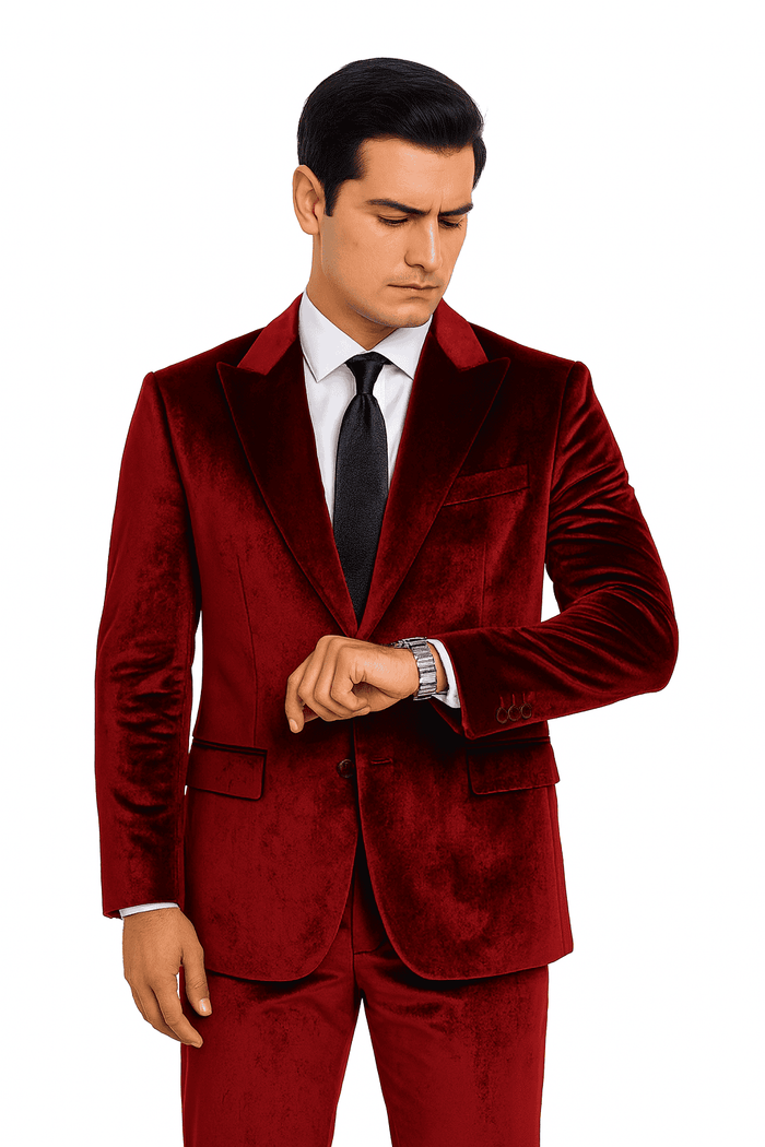 Burgundy men's velvet suit. Slim fit, peak lapel. Smooth texture, button jacket closure with two pockets. Matching tailored trousers. Elegant and stylish.
