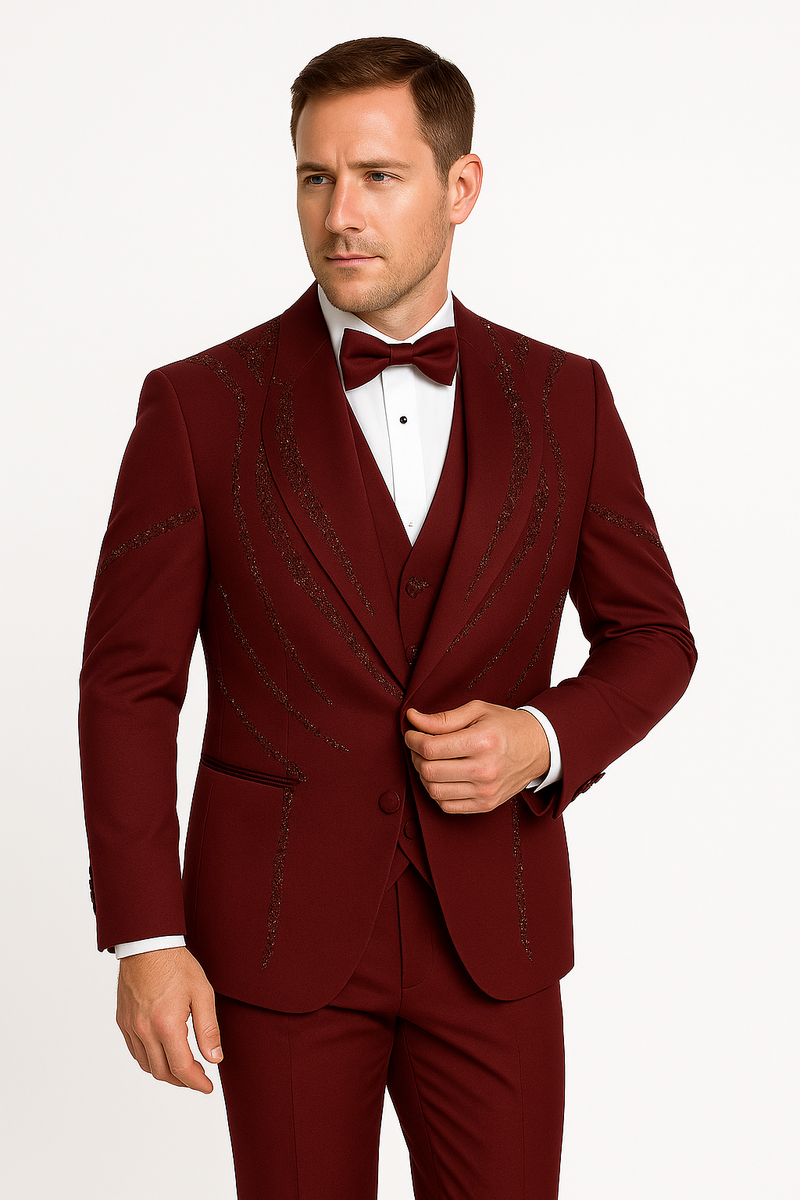 Alberto Nardoni men's burgundy Italian wool tuxedo. Modern three-piece with fitted silhouette, peak lapel, textured wool blend. Jacket with contrasting patterns. Includes matching pants, white shirt, and bow tie.
