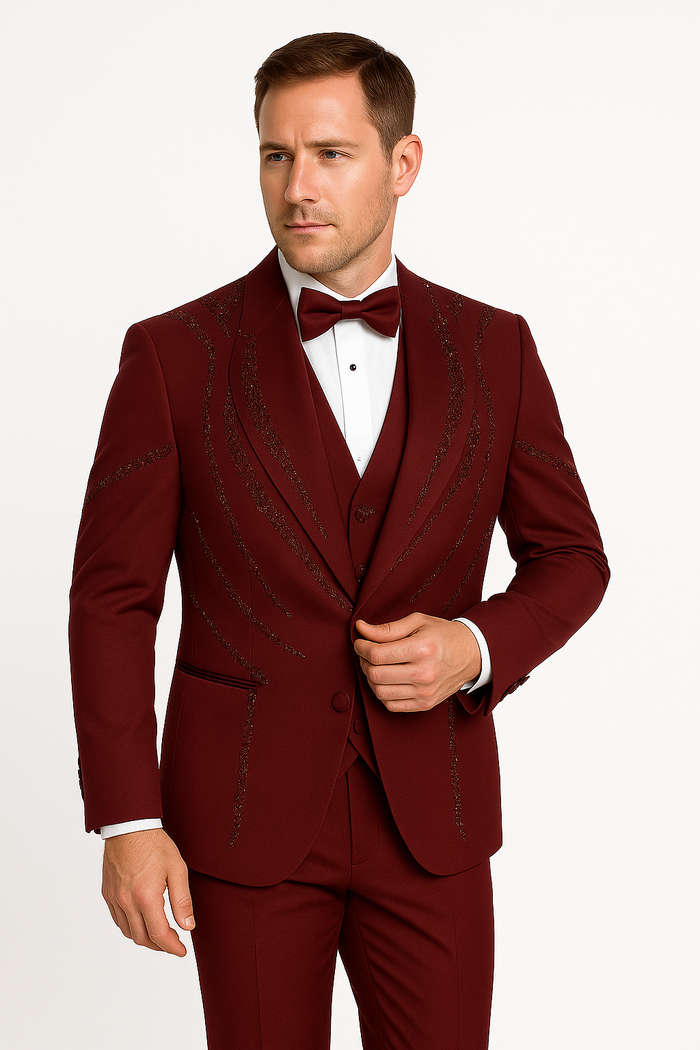 Alberto Nardoni men's burgundy Italian wool tuxedo. Modern three-piece with fitted silhouette, peak lapel, textured wool blend. Jacket with contrasting patterns. Includes matching pants, white shirt, and bow tie.
