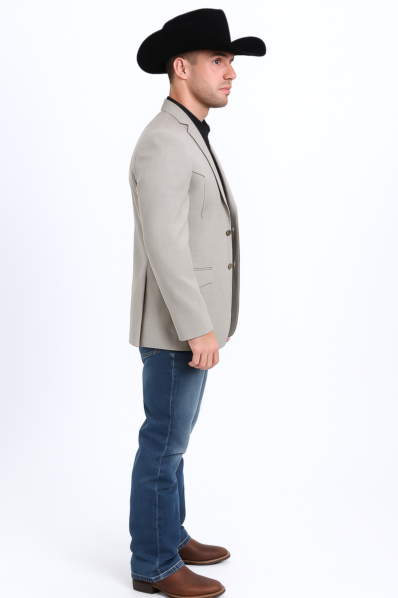 Beige men's double-button Western blazer with structured fit, notched lapel, and textured fabric. Features two front pockets. Shown over a black shirt, paired with blue denim jeans.
