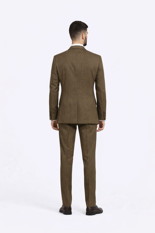 Brown double-breasted suit made of a textured fabric, featuring a notched collar. The jacket has two visible back vent openings. The trousers are tailored to a straight fit.