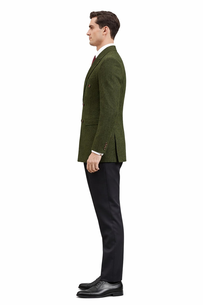 Men's dark green winter blazer. Tailored, double-breasted with textured fabric. Notch lapels, dual buttons, and paired with black trousers.
