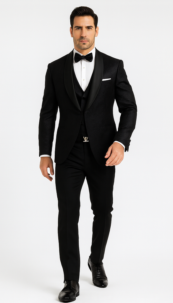 Black floral lace tuxedo. Structured jacket with satin lapels, vest, white shirt, and tailored black trousers. Intricate floral patterns for a formal look.
