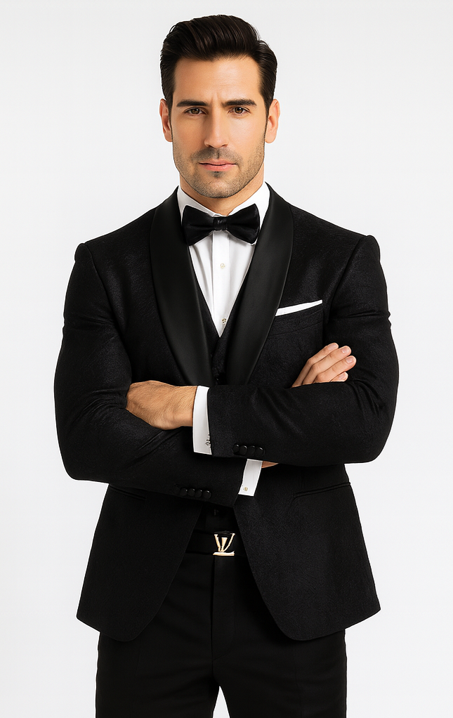 Black floral lace tuxedo with satin shawl collar, fitted silhouette. Includes vest & white shirt. Boutique style, elegant formalwear for men.
