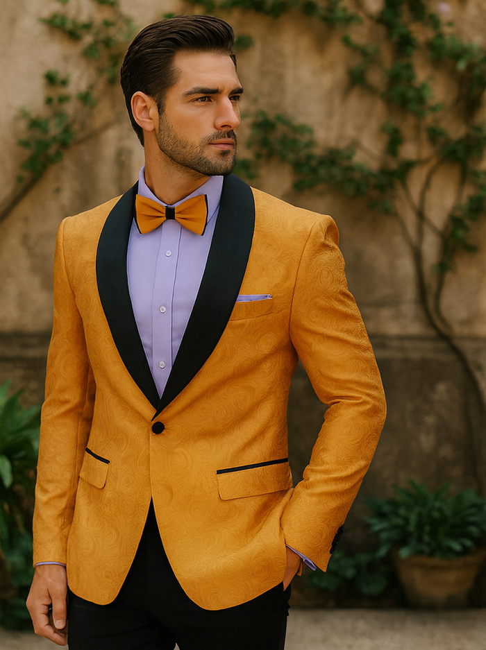 Gold tuxedo with floral texture and black satin lapel. Paired with a light purple dress shirt, matching bow tie, and black trousers for a formal look.
