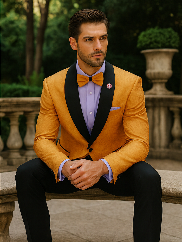 Gold jacket tuxedo with subtle pattern, black lapels. Lavender shirt, matching bow tie. Completed with fitted black trousers. Elegant and contrasting.
