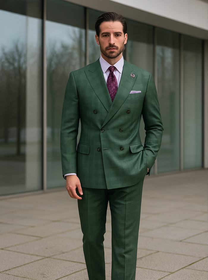 Men's deep green, double-breasted suit with a subtle check. Structured shoulders, tailored fit. Notch lapel, two rows of buttons, pocket square. Paired with a white shirt and textured purple tie. Slim-fit trousers.
