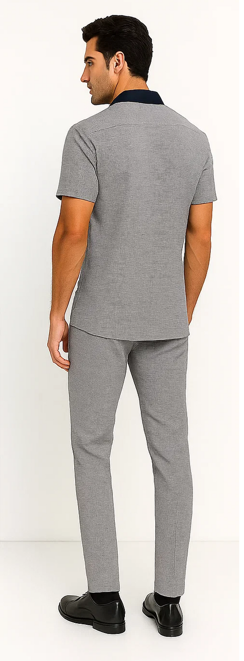 Men's houndstooth walking suit: short-sleeved top & pants. Navy collar, navy/white houndstooth pattern. Relaxed top, straight cut. Slim, tailored pants. Woven, textured fabric. Seamless design.
