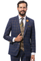 Marc Darcy wedding suit: Modern fit, deep blue with light brown double windowpane plaid. Features notch lapel, two front pockets on the coat. Trousers match. Fine-textured fabric.
