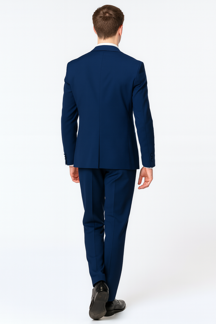 Navy tuxedo with blue trim: satin shawl lapel, matching bow tie. Three-piece suit: fitted jacket, smooth back, tailored trousers.
