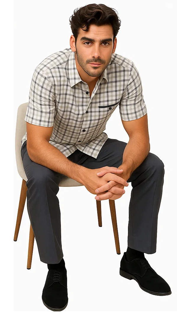 Grey plaid men's walking suit. Short-sleeve shirt with light/dark grey check, button-down front, and pocket. Charcoal grey straight-leg trousers. Woven fabric for a coordinated look.
