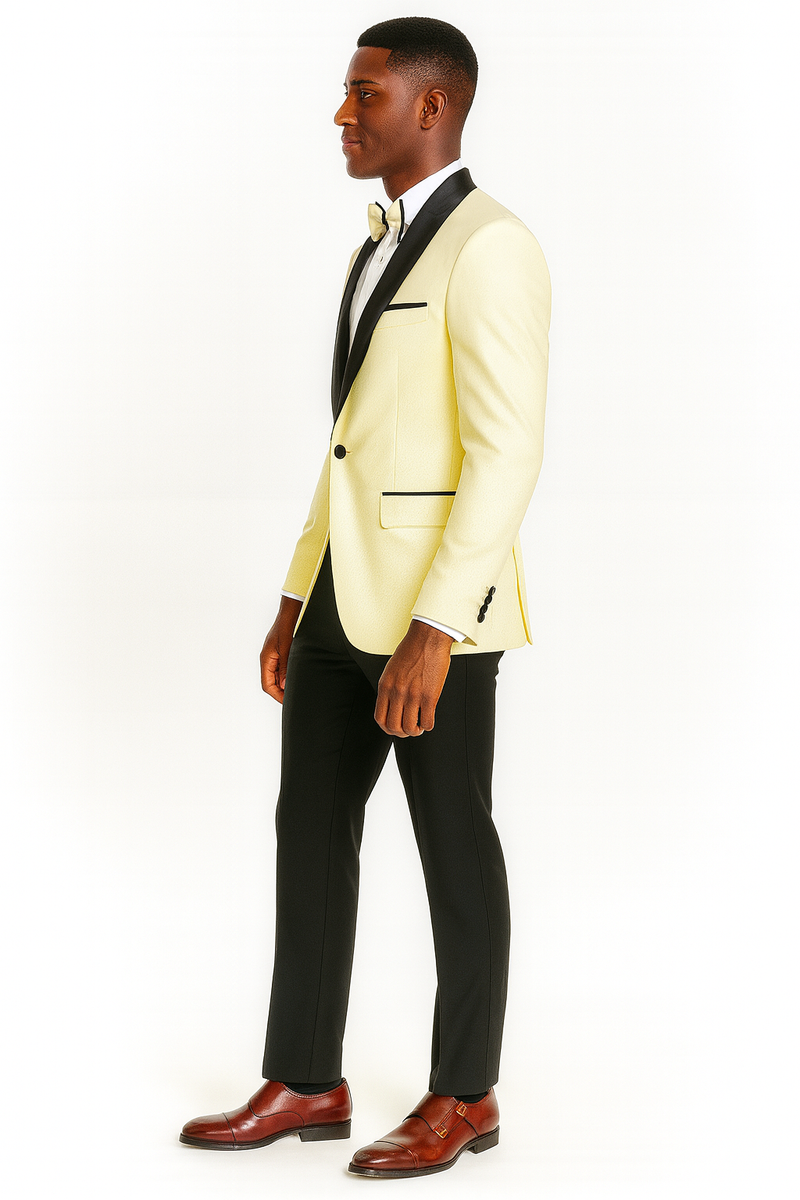 Big & tall ivory jacket suit with black shawl collar & pants. Single button closure. Includes black bow tie & tailored fit. Brown polished shoes complete the formal look.
