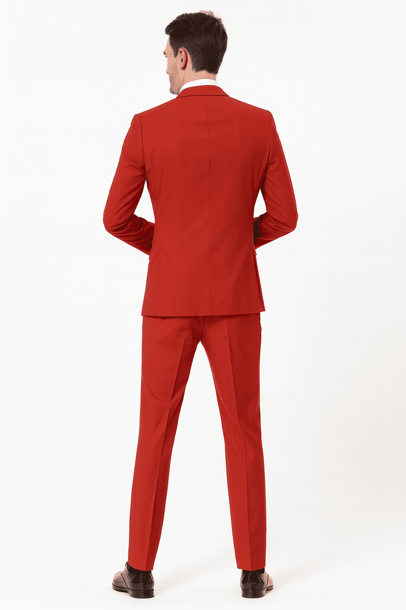 Men's red tuxedo: sequin lapel, matching trousers & bow tie. Features a fitted jacket with structured silhouette. A stylish three-piece formal ensemble.
