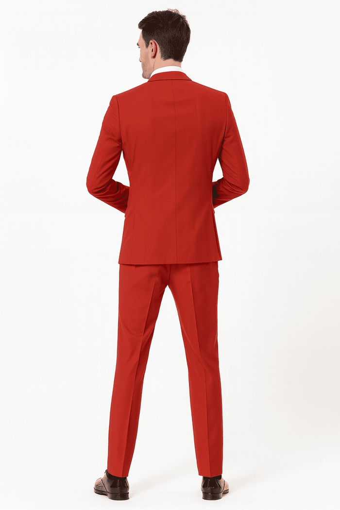 Men's red tuxedo: sequin lapel, matching trousers & bow tie. Features a fitted jacket with structured silhouette. A stylish three-piece formal ensemble.
