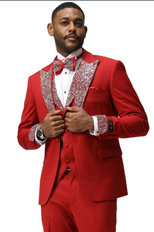 Dazzling men's red tuxedo: sequined lapel, fitted cut, and matching bow tie. Bright red fabric, single-breasted jacket, decorated cuffs, and pocket square. White shirt enhances the color contrast.
