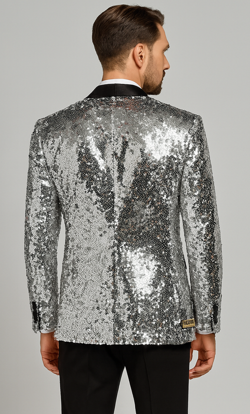 Men's silver sequin tuxedo: shimmering silver sequin exterior, black satin lapel. Tailored fit jacket, long sleeves, single back vent.
