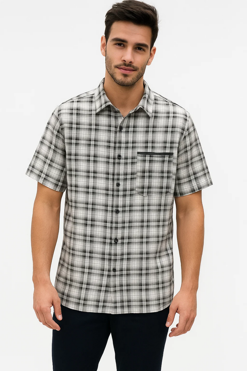 Men's black & white plaid walking suit. Short-sleeved shirt with button-down front, chest pocket, and classic grid pattern. Standard collar and curved hem.
