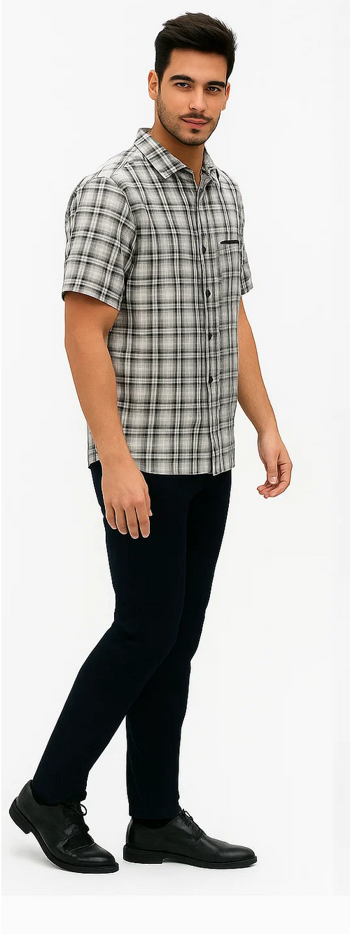Men's textured plaid walking suit: short-sleeve black & white checkered button-up shirt with front pocket, paired with dark trousers.
