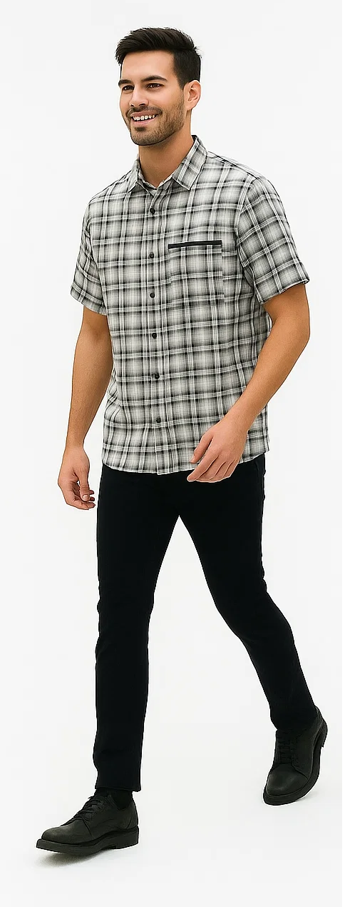Men's black & white textured plaid walking suit. Short-sleeve button-up shirt with chest pocket. Fitted black pants. Plaid shirt with grid pattern, contrasting solid pants.
