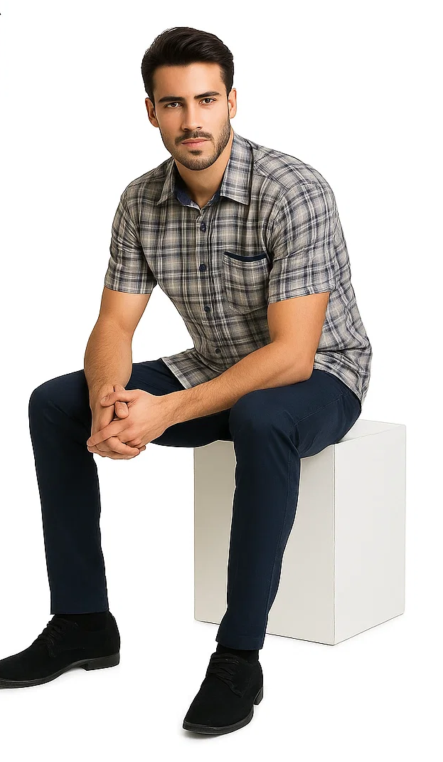 Men's textured plaid walking suit in navy and white. Short-sleeved collared shirt with pocket. Tailored trousers. Lightweight fabric for casual wear. Distinct navy/white plaid pattern.
