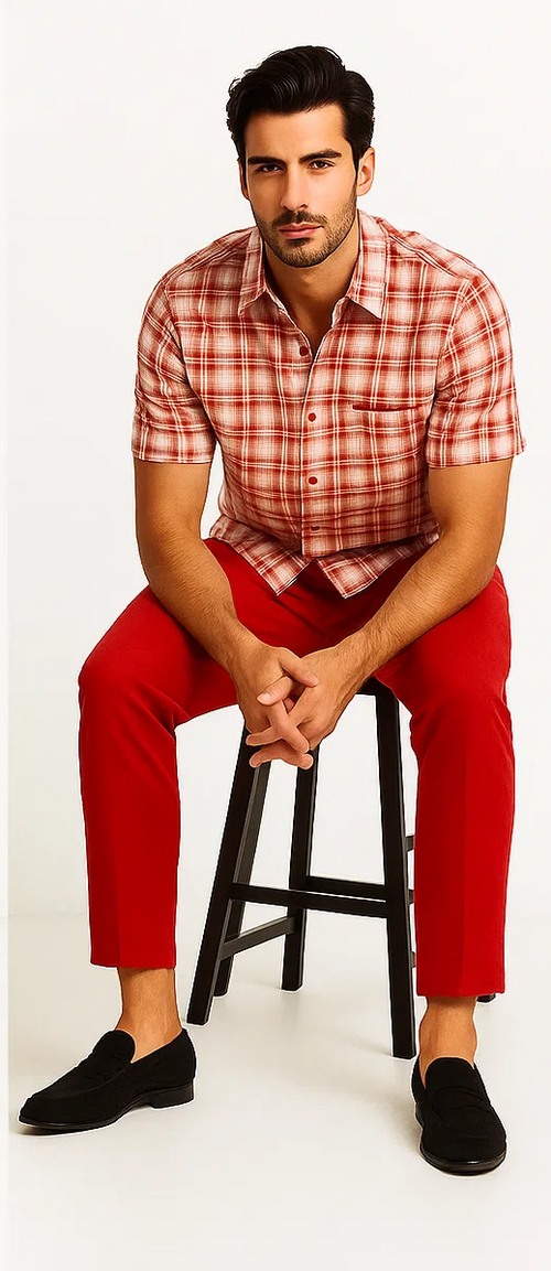 Men's plaid walking suit: red/off-white patterned short-sleeve shirt with a button-up front & pocket. Red, tapered, slim-fit pants. A coordinated ensemble.
