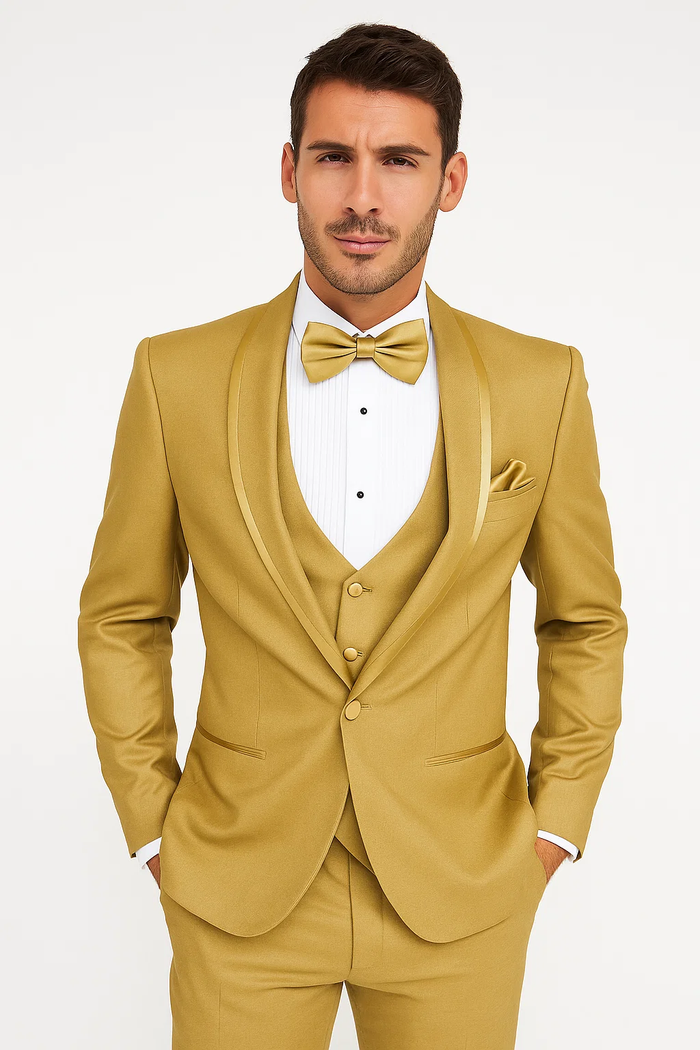 Alberto Nardoni men's champagne tuxedo: fitted, single-breasted jacket with satin lapels, matching vest, flat-front trousers. Includes a white dress shirt, champagne bow tie, and pocket square. Smooth fabric.
