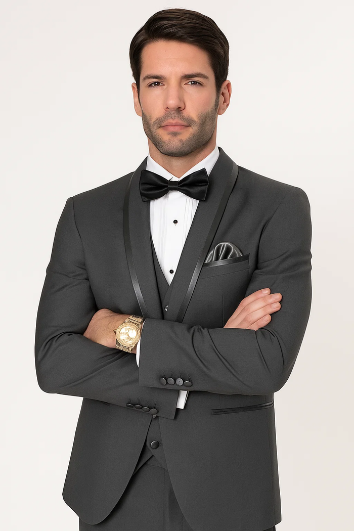 Men's charcoal satin tuxedo suit with a tailored fit. Shawl collar, satin lapels, and a single breast pocket on the jacket. Includes a matching waistcoat. Smooth, glossy finish for a formal look.
