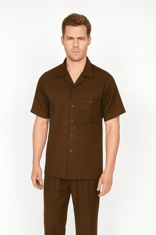 Brown men's leisure suit. Includes short-sleeved shirt with pocket & buttons, plus relaxed-fit pants. Smooth, solid-colored fabric.
