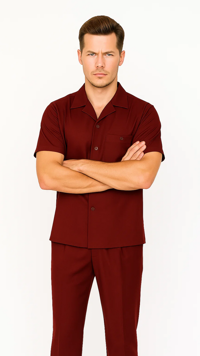 Burgundy men's leisure suit: short-sleeve button-up shirt with pointed collar & front pocket, plus matching straight-leg pants. Loose fit, solid color, coordinated look.
