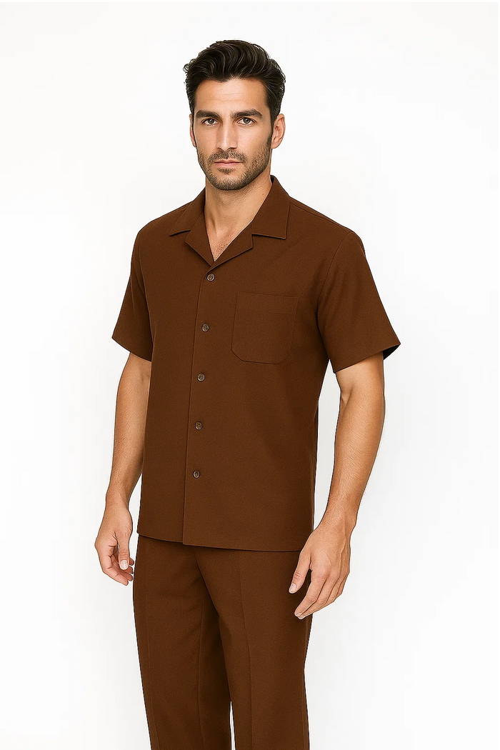 Cognac-colored men's leisure suit: short-sleeve button-up shirt with chest pocket, notched collar, and five buttons. Matching straight-leg pants. Smooth, matte finish fabric.

