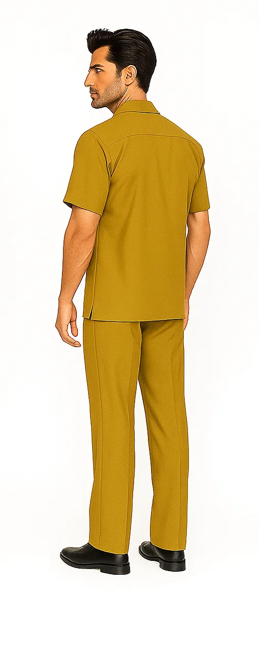 Mustard men's walking suit. Includes a short-sleeve, straight-cut leisure shirt and straight-leg pants. Made of smooth, lightweight material.
