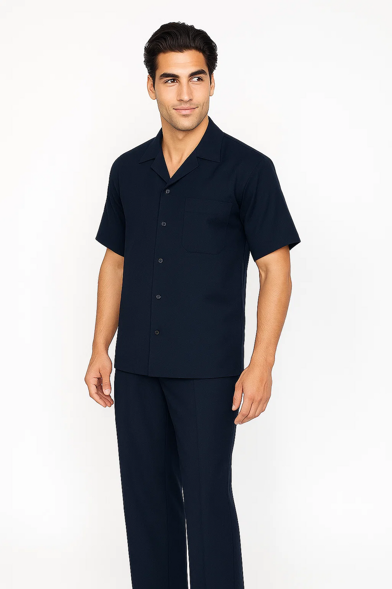 Navy blue leisure suit: short-sleeve button-up shirt with collar, chest pocket, and straight fit. Matching loose-cut pants for comfortable wear.
