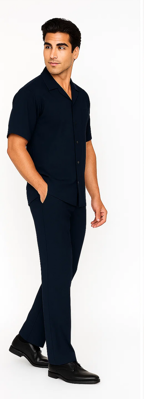 Navy leisure suit: short-sleeve shirt with button closure, pointed collar, chest pocket. Matching straight-cut pants. Solid navy, lightweight, smooth fabric. Clean finish.
