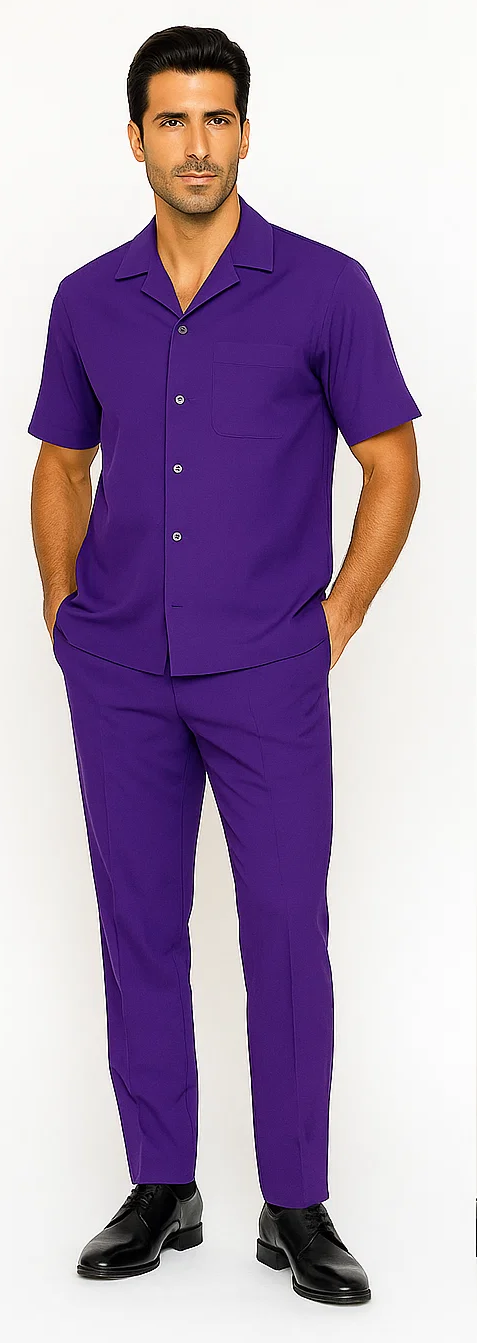 Men's vibrant purple leisure suit. Includes a short-sleeve shirt with collar, button closure, and chest pocket, paired with straight-leg pants. Made from a smooth, solid fabric.
