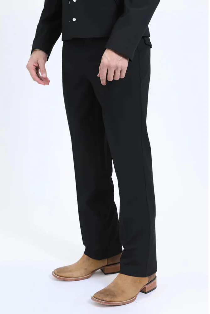Alberto Nardoni men's black western sport suit. Fitted, cropped jacket with silver buttons. Straight-leg trousers. Solid black fabric. Paired with contrasting tan western boots. Sleek silhouette.
