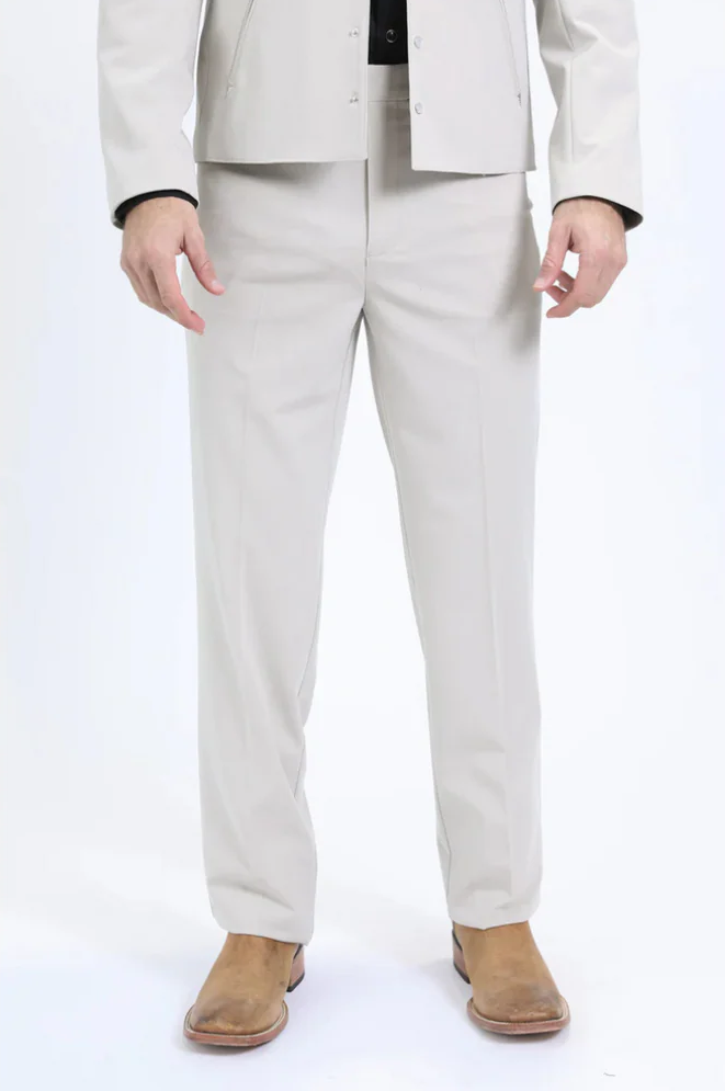 Alberto Nardoni men's western suit. White, straight-cut jacket with smooth texture. Slim-fit tailored pants with creases. Lightweight fabric, modern design, minimal detailing, formal aesthetic.
