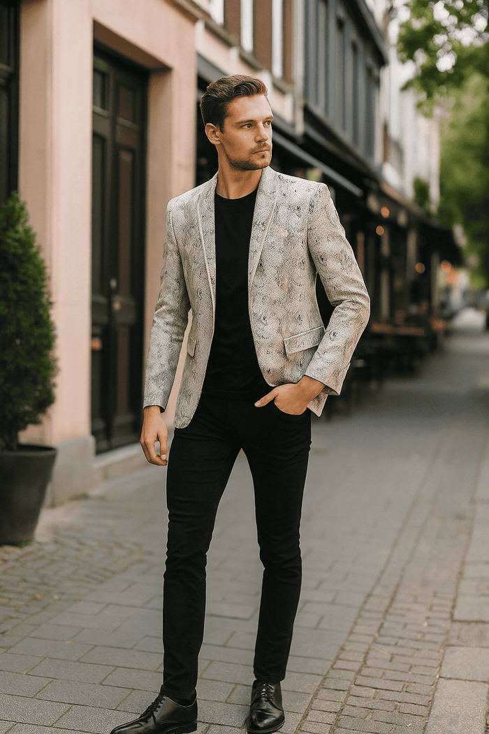 Men's white snake print blazer. Exotic slim fit, alligator-crocodile pattern. Light white/grey color scheme, smooth fabric. Single-button closure, notch lapels, two front pockets. Formal.
