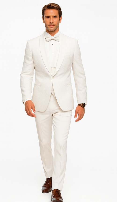 Men's white designer tuxedo with vest & floral lace. Includes blazer, bow tie & slim trousers. Elegant, uniform white design.
